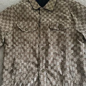 Gucci jacket giving as a gift but not my size too small for me